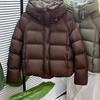 Herbst und Winter einfarbige Puffärmel kurze Kapuzen-Loose-Brotkleidung verdickte warme Baumwollkleidung Jacke