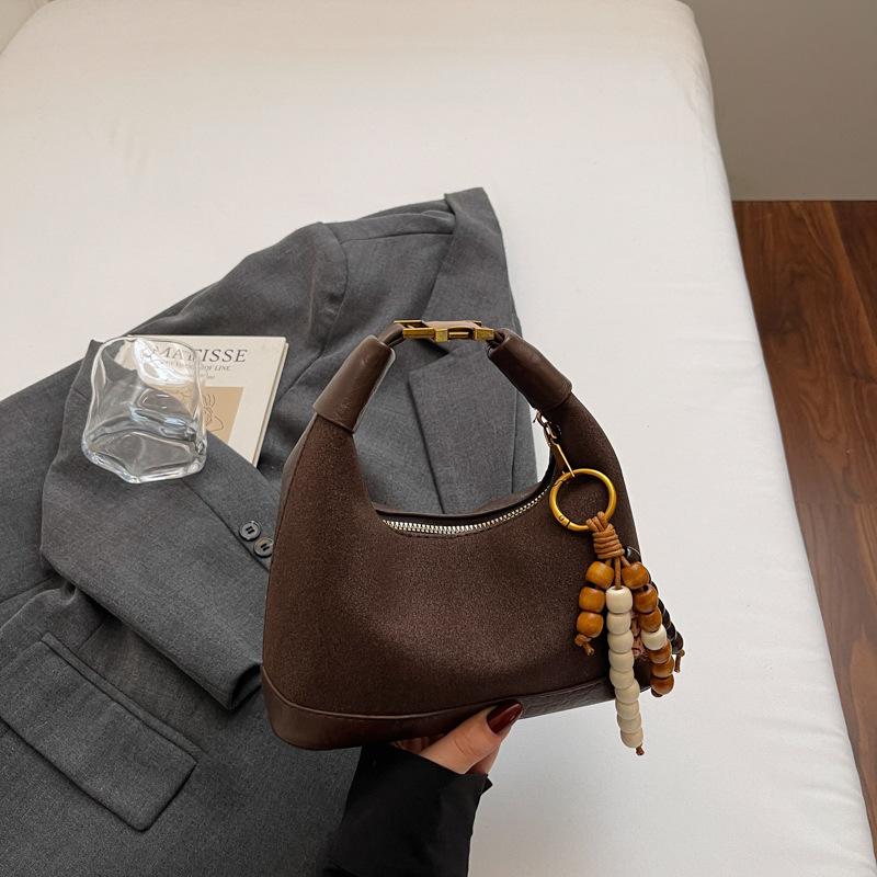 

Retro niche small bag 2025 autumn new fashion messenger bag simple work small bag portable dumpling bag no pendant темно-коричневого