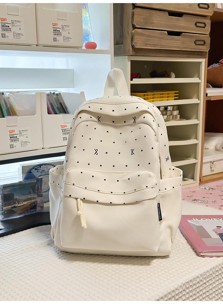 Schoolbag girly heart atmosphere polka dot bow versatile high value backpack female student schoolbag commuting simple backpack