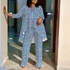 Women Plus Size Coordinated Two Piece Set Round Neck Three Quarter Sleeve Irregular Hem Top Printed Wide Leg Pants