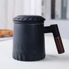 Cha Xun Ceramic Tea Mug with Lid, Infuser, and Wooden Handle