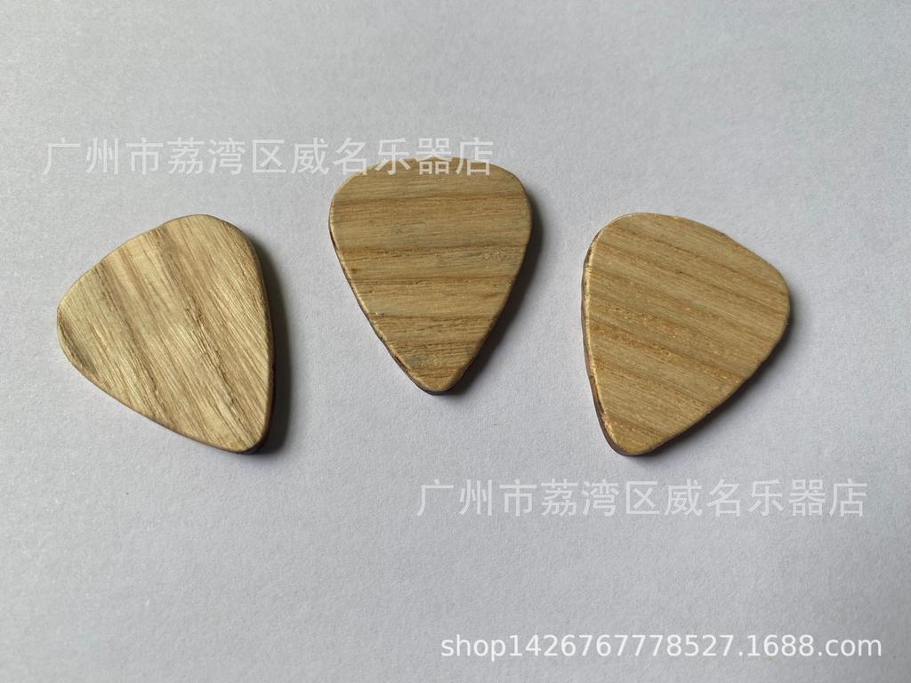 Electric and Wooden Guitar Picks: Thumb, Index, and Acoustic Options
