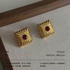 Medieval vintage earrings retro hammer pattern hollow relief gold and silver geometric niche light luxury earrings