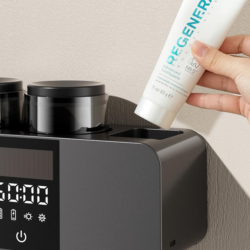 Olovvs Smart UV-Zahnbürstensterilisator mit elektrischer Trocknung, stanzfreier Installation, Mundspülbecher und Zahnpastahalter.