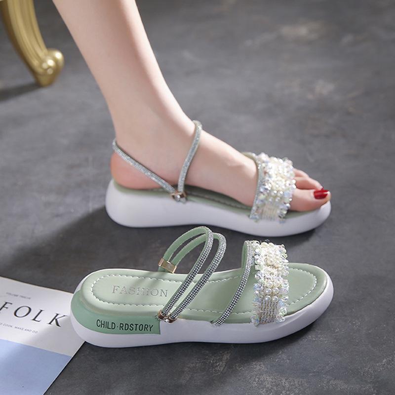 

Беременные женщины носят сандалии и женские стразы на плоской подошве летом, одно слово с крутыми шлепанцами и одной педалью, и носят корейскую версию на мягкой подошве 40