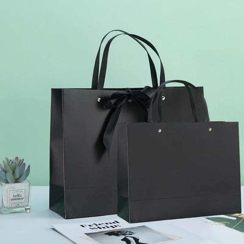 White Paper Jam Handbag Kraft Paper Thick Waterproof Frame Rivet Handle Gift Bag Cosmetic Clothing Store Portable Packaging Bags