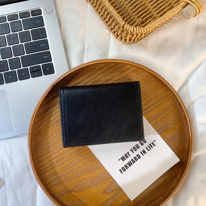 

2025 новый кошелек женский короткий кошелек многокарточный большой вместимости многофункциональный кошелек для мелочи чёрный