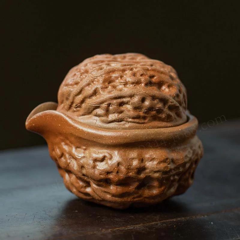 

Чайник из фиолетовой глины с грецким орехом Ручной чайник для одного человека Китайский стиль Один чайник Одна чашка Ситечко для чая