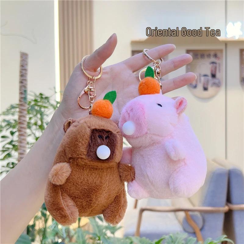 Plyšová klíčenka Kapybara s bublajícím a třesoucím se zvukem - Roztomilá ozdoba a panenka do drápkového automatu