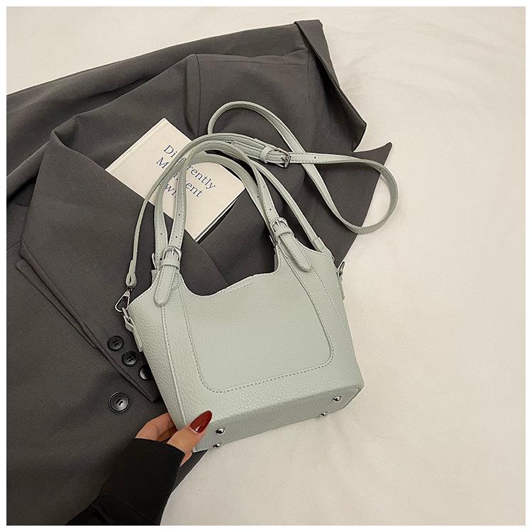 Fashion hand-held women's bags New retro underarm shoulder messenger bags Casual work commuter bucket bags