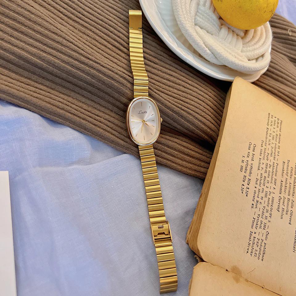 New Gold Vintage Niche High-end Fashion Popular Watch, Small Gold Watch, Women's Quartz Steel Strip Watch