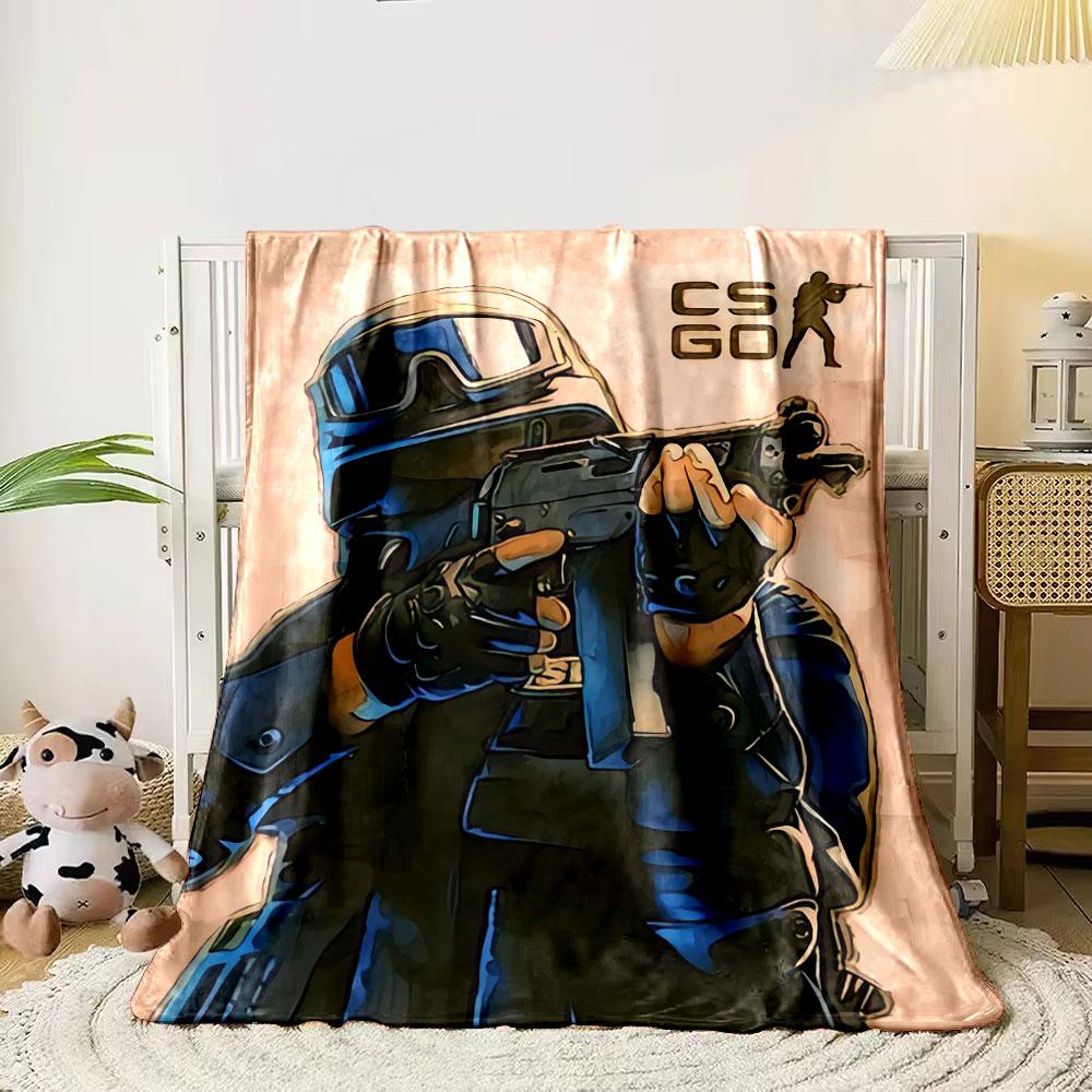 Illustration of a tactical figure aiming a weapon, with "CS GO" emblem nearby. for all seasons blanket lunch break throw gift