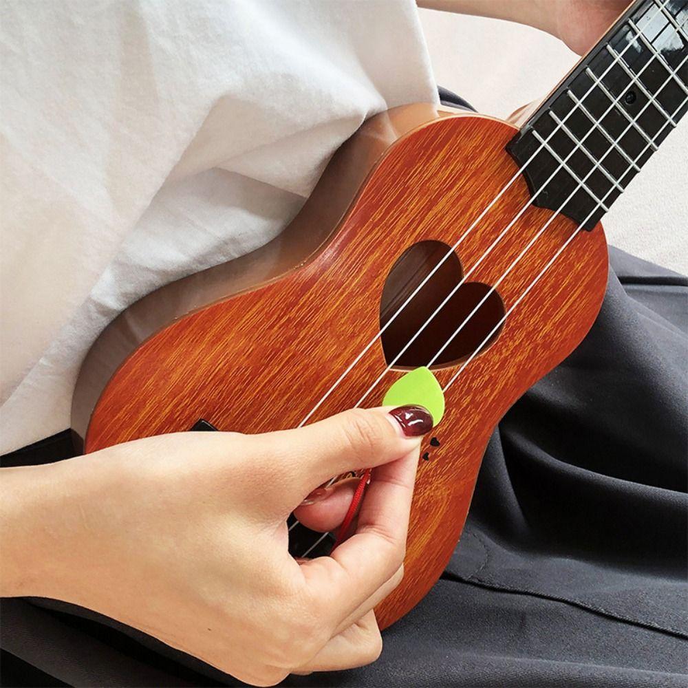4 Strings Ukulele Musical Instrument Toy Yukrili Toys Small Guitar Toy Beginners