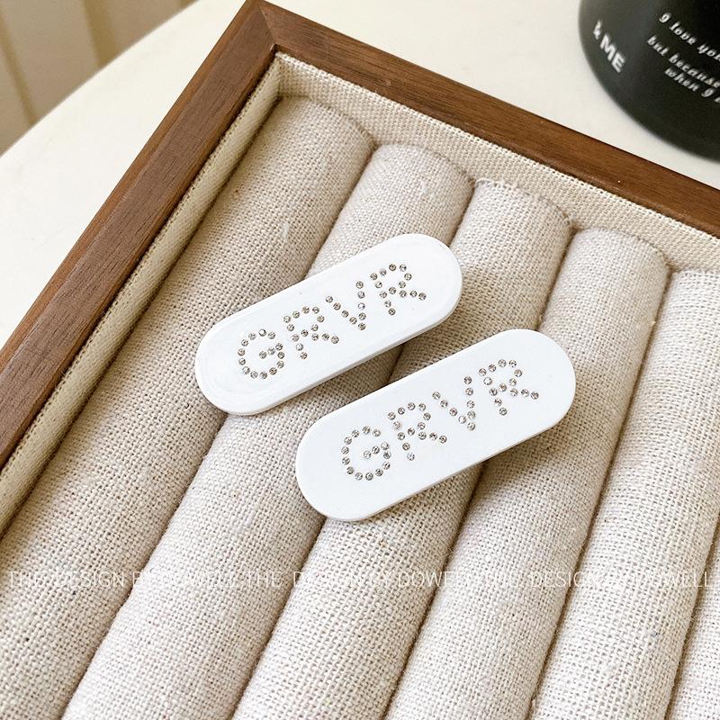 

Trendy Acetate Side Hair Clip With Sparkling Letter Design Perfect For Fashionable Women White Card