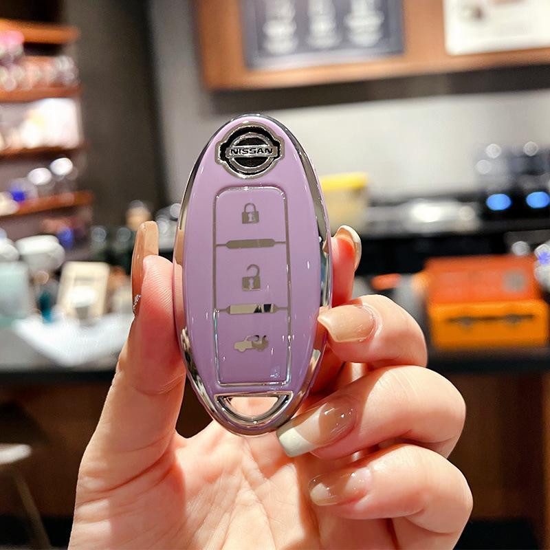 

Подходит для комплекта ключей Nissan Qijun Всеобъемлющая пряжка для автомобиля Tule Loulan Teana Bluebird Xuanyi высококлассный защитный чехол-пряжка