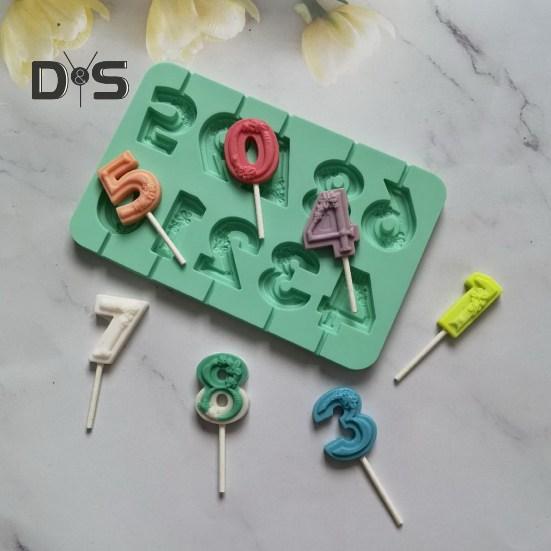 Flexibel chokladform för mångsidigt användbar numerisk klubba för konditorivaror