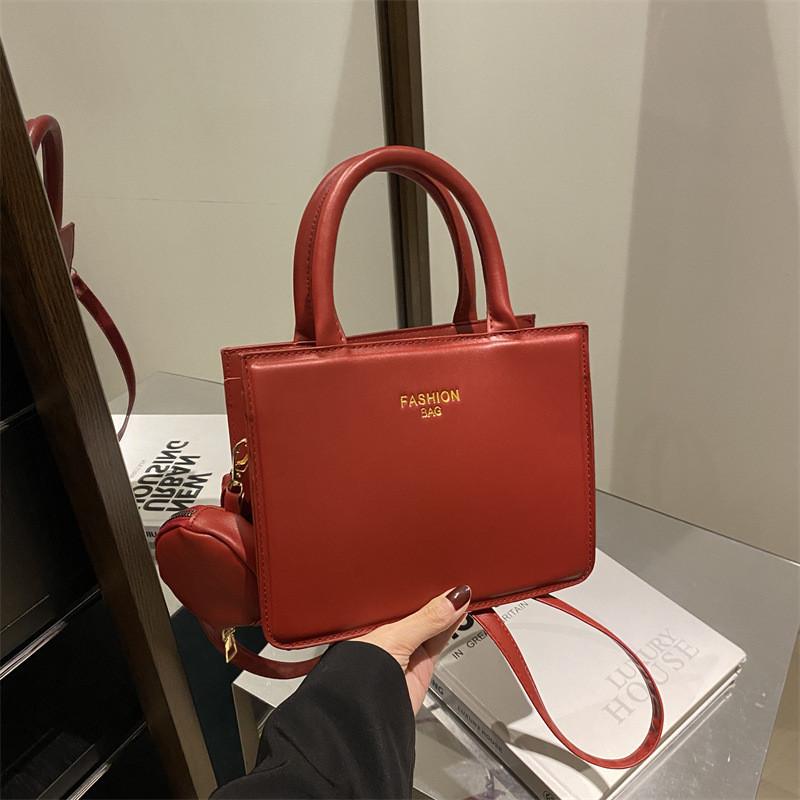 

Chic Small Square Handbag With Trendy Street Style Features For Modern Commuters StyleE
