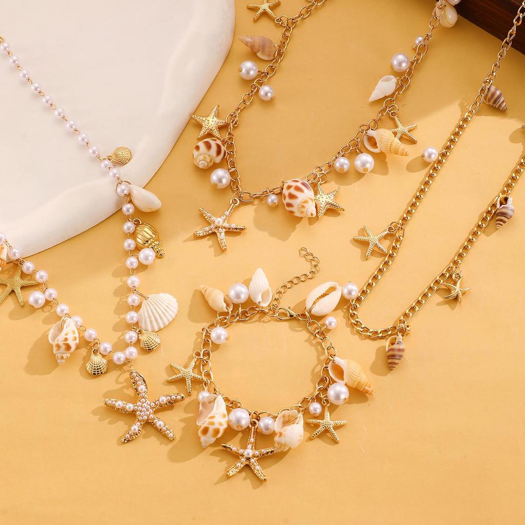 Set Collana e Bracciale Estivo Bohemien con Stella Marina, Conchiglia e Perle