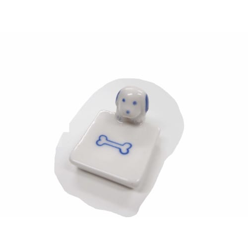 Chopstick rests, dog gazing at a bone, set of 5