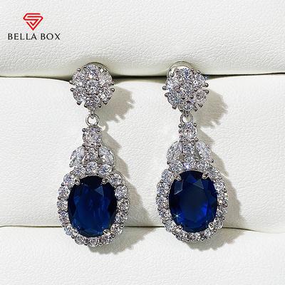 Pendientes colgantes de mujer de nuevo diseño con circonitas cúbicas azules y blancas de lujo, accesorios para las orejas con temperamento, joyería de alta calidad.