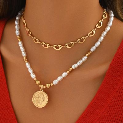 Collana di Perle Finte Multistrato di Lusso con Ciondolo a Testa Umana