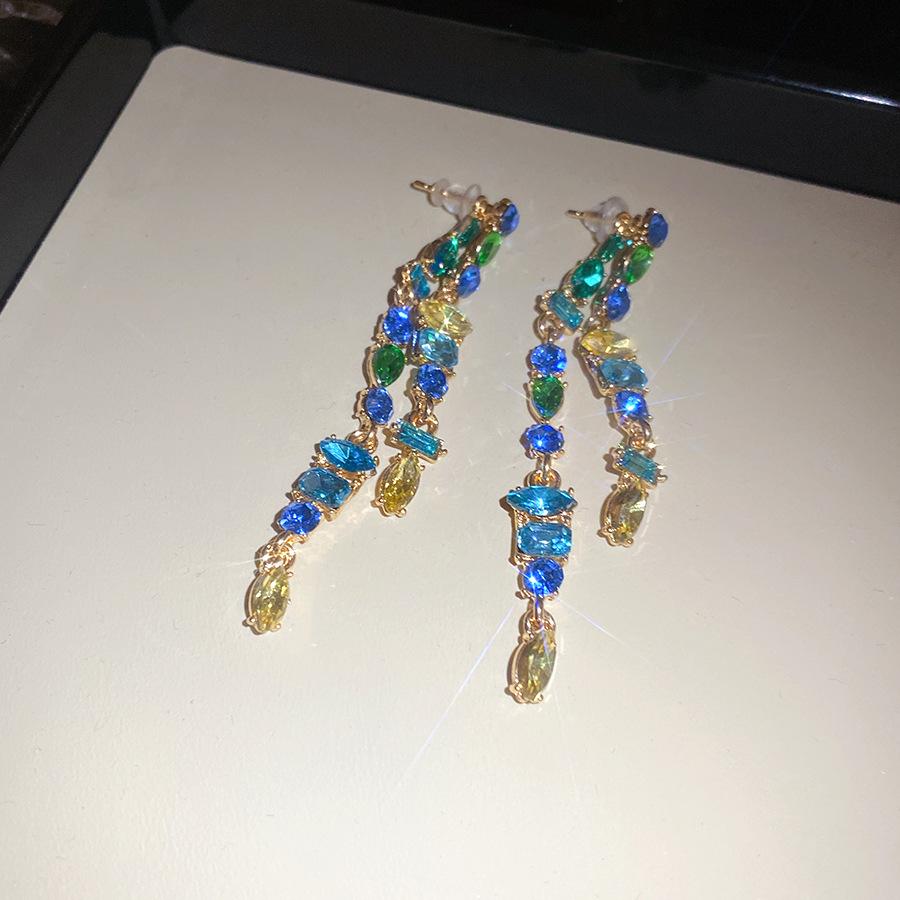 

Silver needle zircon oval fringed earrings light luxury high-end stud earrings European and American personality trend exquisite earrings