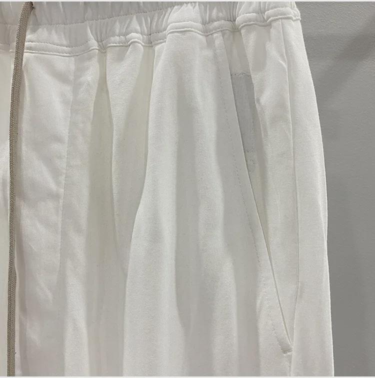 SUBHUMAN Pánská tmavá série: Slonově bílé zkrácené harémové pletené kalhoty - Letní ležérní móda