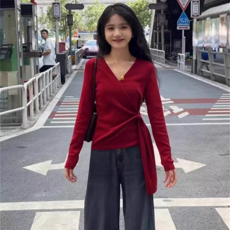 

Ankola red v-neck knitted sweater Korean gentle wind cross strap design sense autumn and winter new long-sleeved women One size