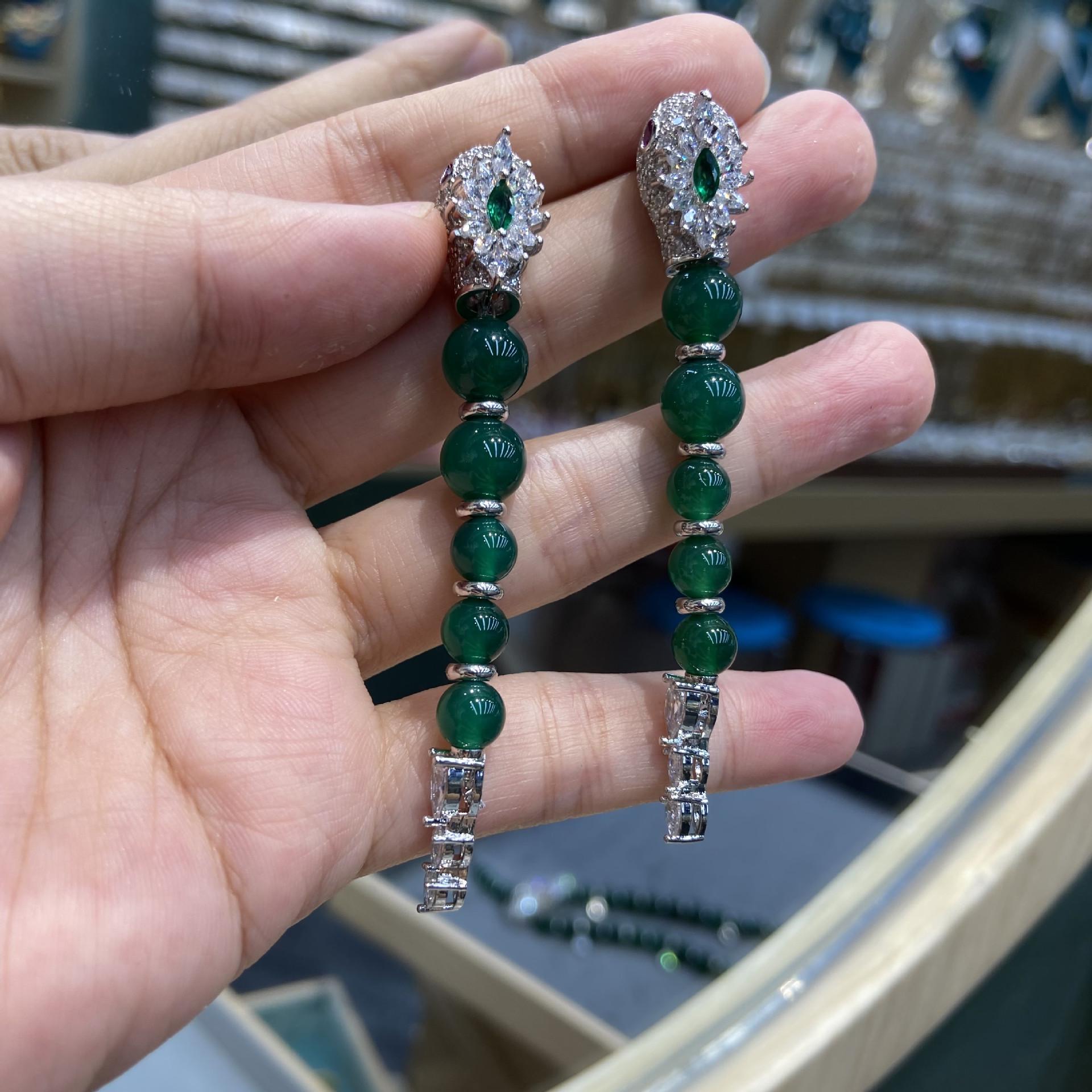 

Набір срібних сережок S925 з агатом та цирконієм і намисто у вигляді змії - Високорозкішна серія Змія для жінок