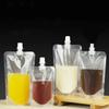 50/100PCS Clear Drink Pouches Packaging Liquid Bag With Nozzle Stand Up Sealed Suction Nozzle Bag Milk Tea Juice Bag Print Logo