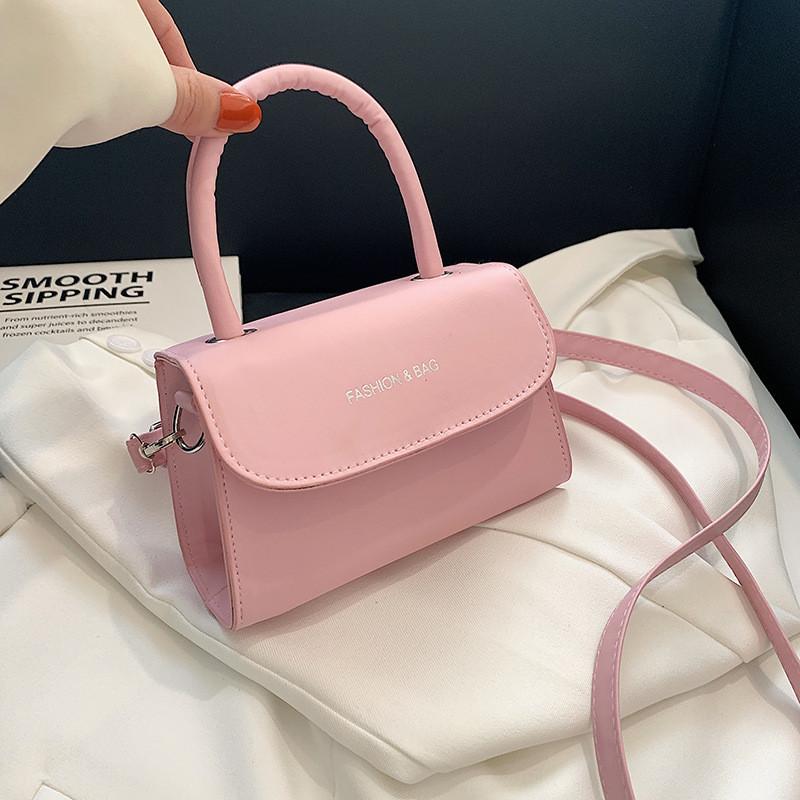 

Stylish Candy Color Mini Handbag For Women In Soft Pu Material For Trendy Fashion Lovers рожевий