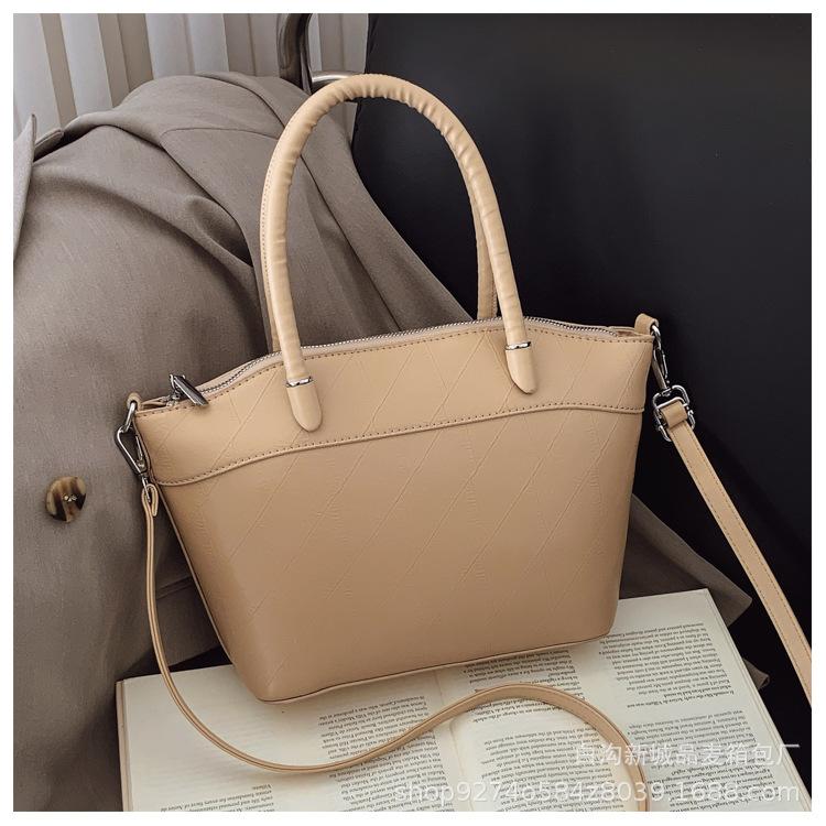 

Portable commuter big bag women 2025 new large-capacity fashion versatile tote bag Korean version of casual messenger bag