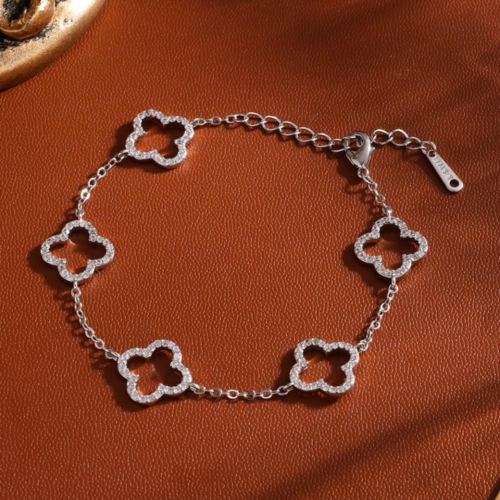 Elegant Female Stainless Steel Bracelet With Zircon Four-Leaf Clover Design Hollow Detail Fashion Accessory For Small Waist