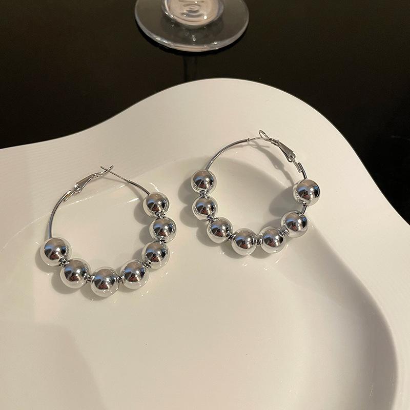 

European and American style artificial pearl ball earrings exaggerated personality fashion ear buckles trendy metal design earrings