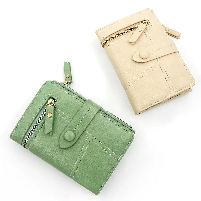 Short women's wallet, leather zipper card bag, trendy change bag.