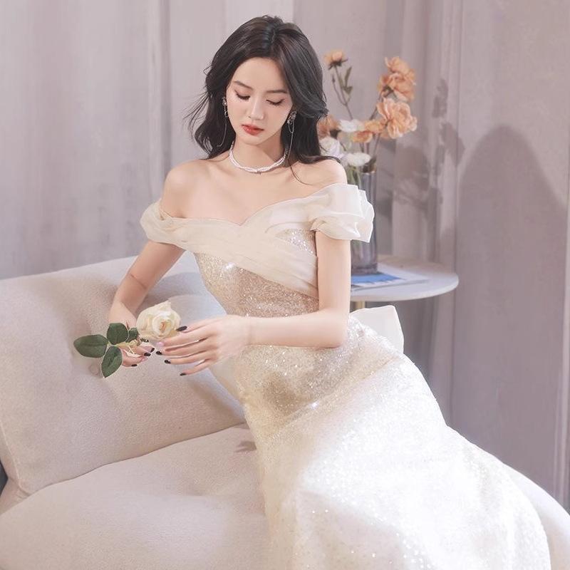 One-word shoulder evening dress skirt 1011 new temperament light luxury niche champagne color super fairy host evening dress