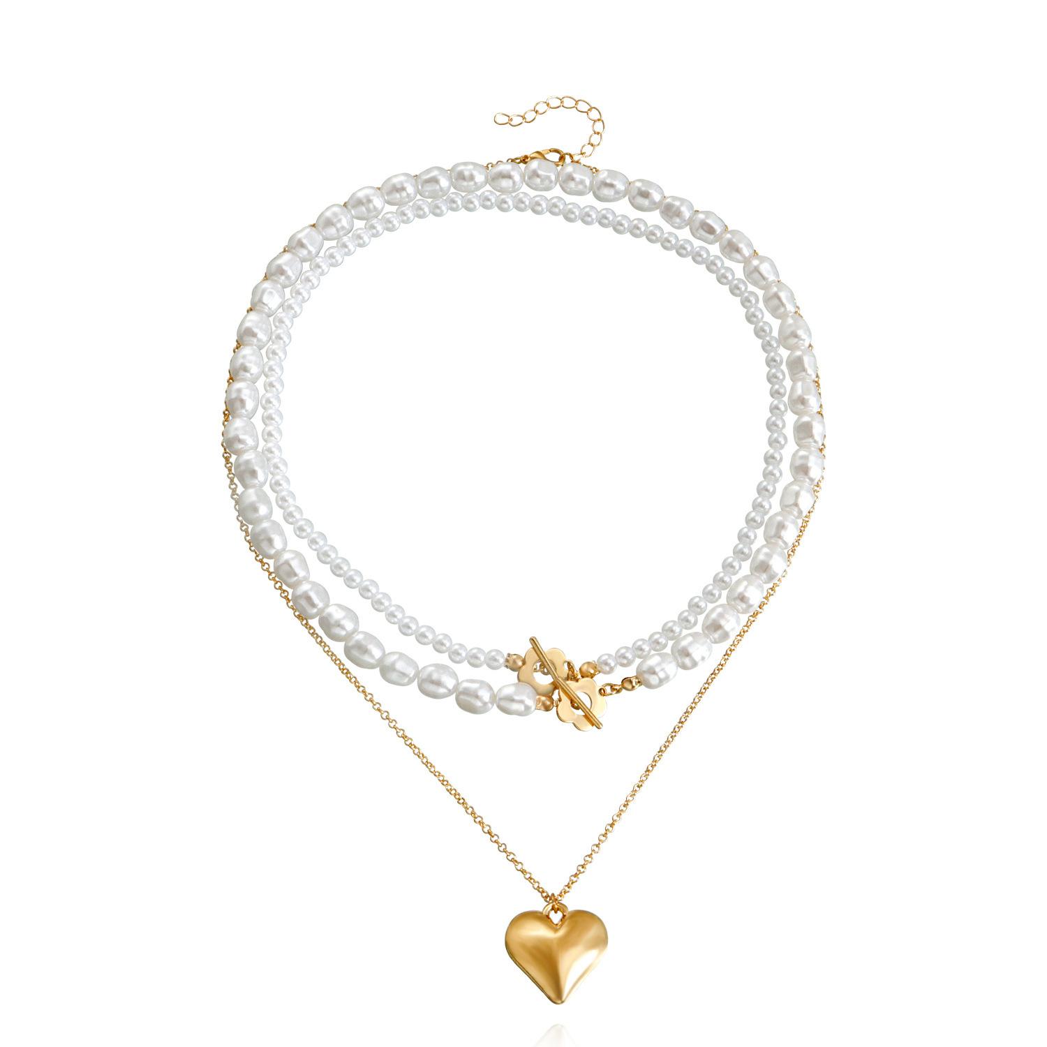 

European and American simple and fashionable imitation pearl versatile neck chain niche natural love pendant collarbone chain золотий