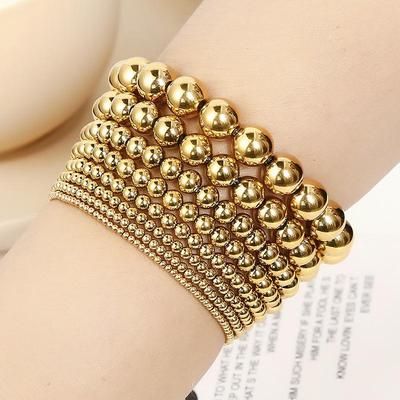 Bracelet Européen & Américain Minimaliste en Acier Inoxydable Élastique à Perles Dorées pour Femmes