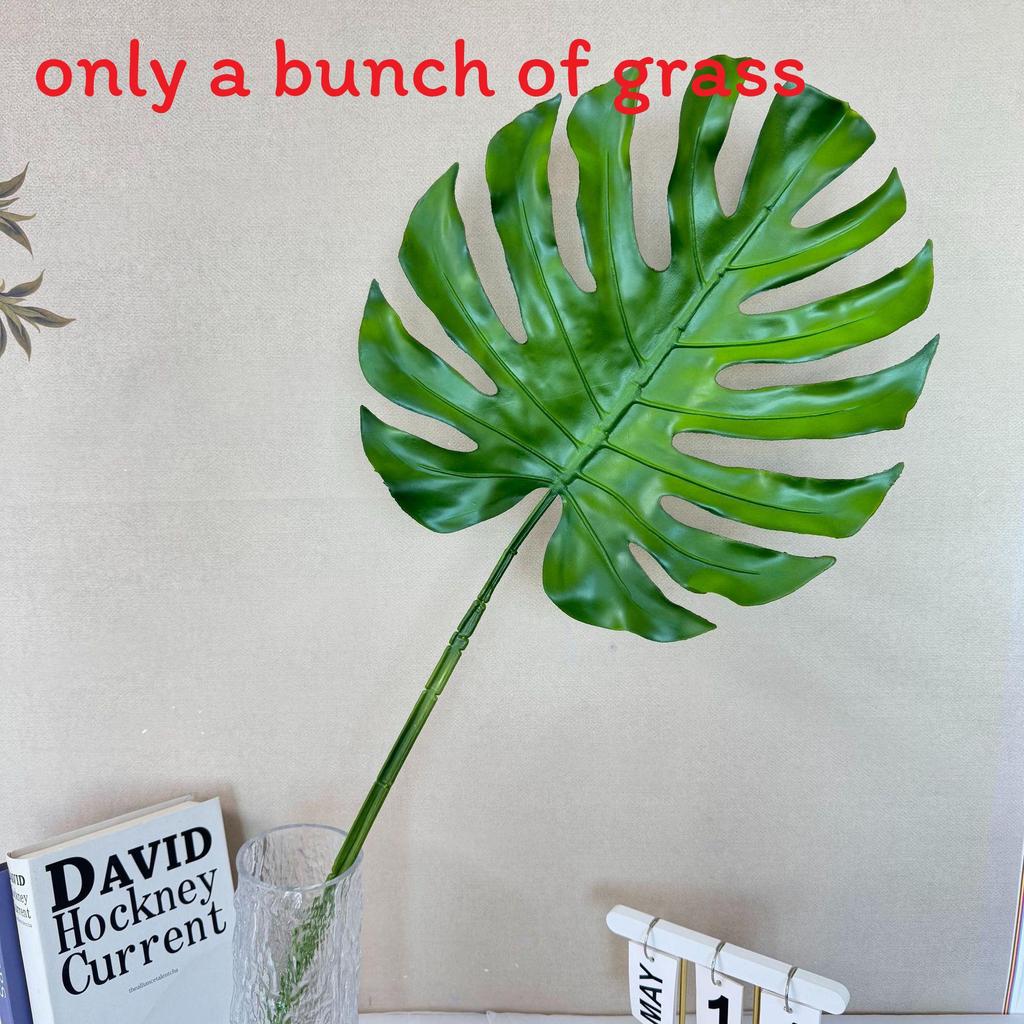 Dekoration i form av en falsk bananbladsfläkt för bröllop och heminredning