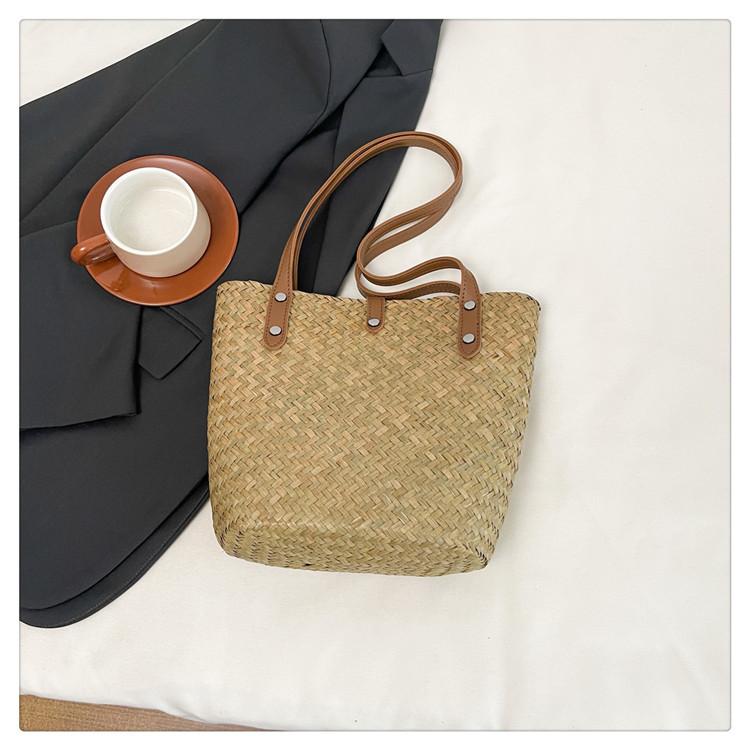 

2025 underarm bag women s summer new straw woven bag fashionable versatile niche design casual shoulder bucket bag