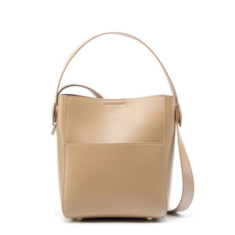 

Design sense niche commuter versatile women s bag spring and summer messenger bag new leather bag women s high-end bucket bag