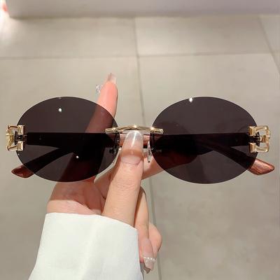 New Luxury Designer Vintage Rimless Oval Sunglasses Women Men Trendy Punk Metal Leopard Eyeglasses