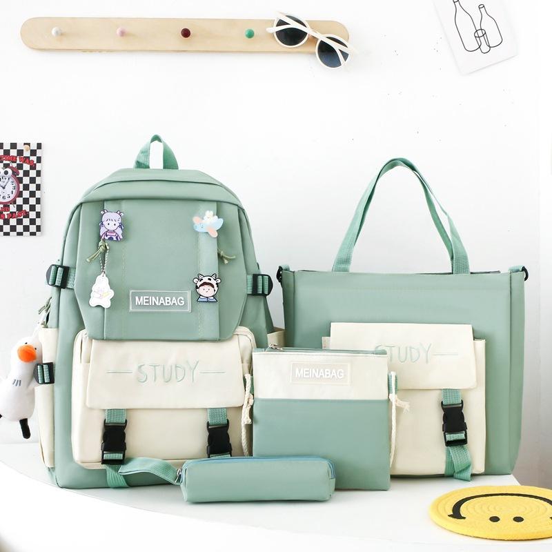 Schoolbag female new high school junior high school students large capacity backpack Japanese Korean version primary school students campus four-piece