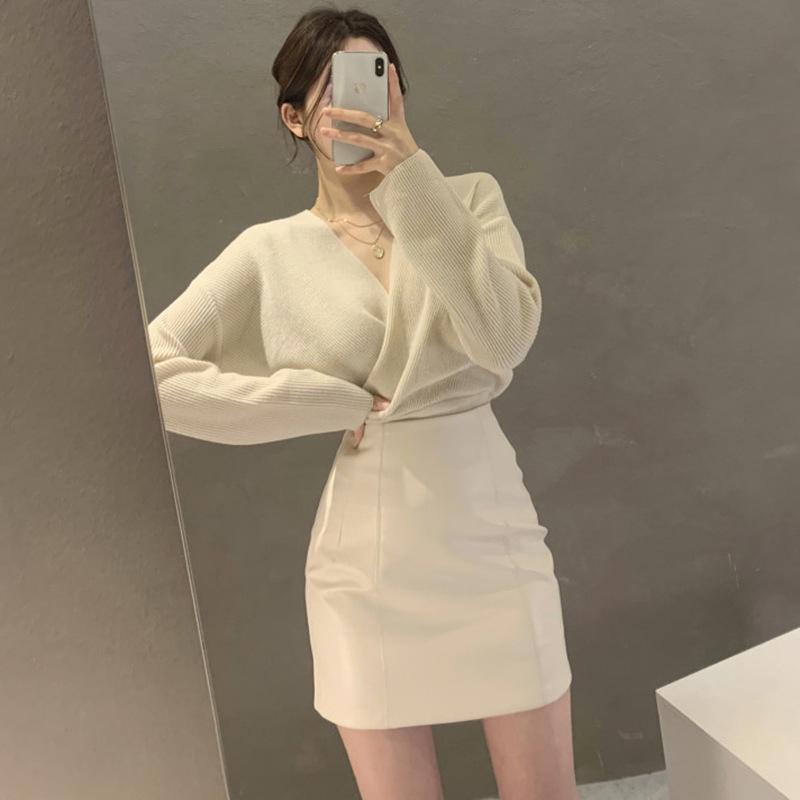 

Женская кожаная юбка А-силуэта с высокой талией и неровным подолом, облегающая фигуру: Короткая и средней длины для весны, осени и зимы. L