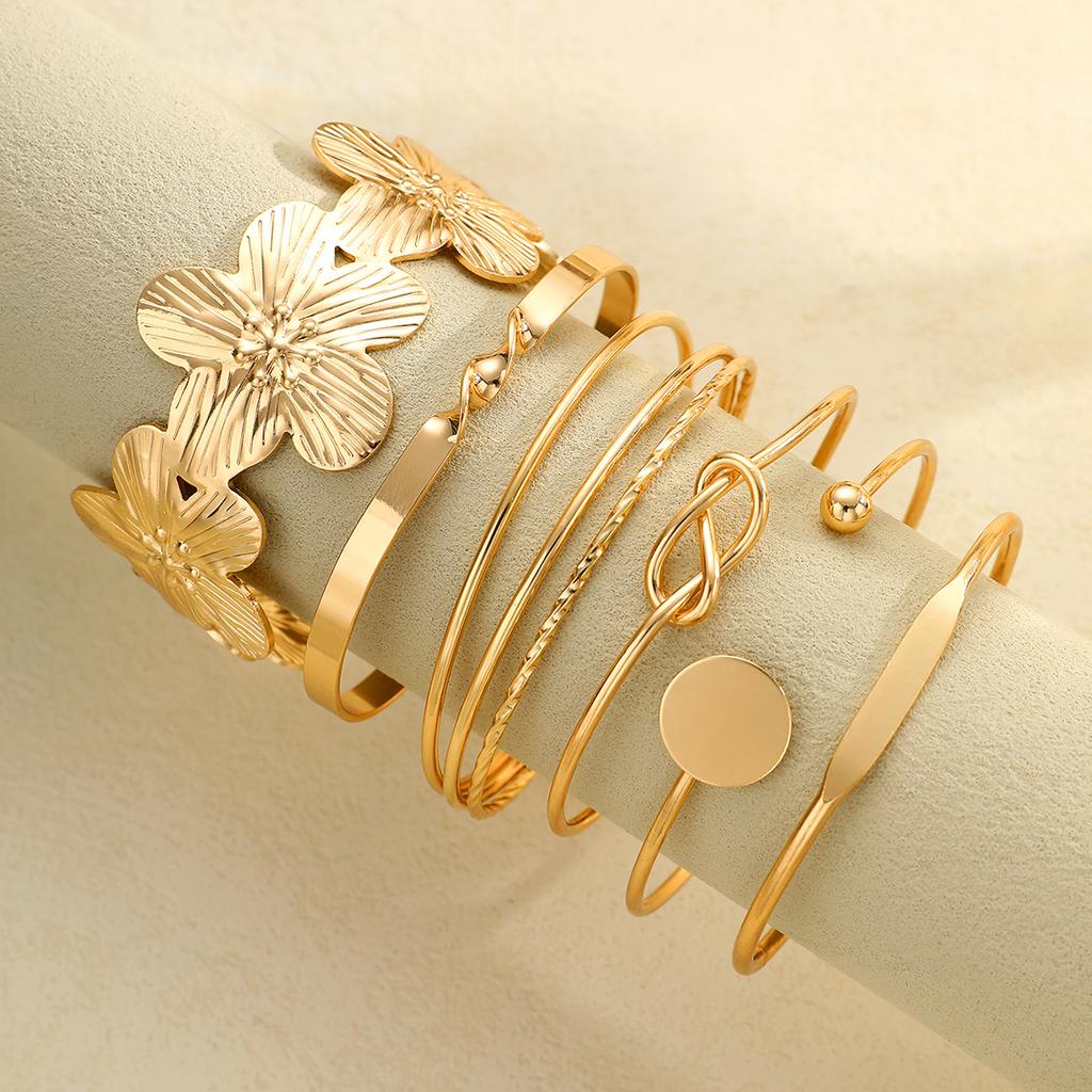 Elegante Vintage Hohllinien-Streifenblumen-Drehmetall-Armreif-Armband-Sets für Damen Tägliches Tragen Party Hochzeit Urlaub Schmuck