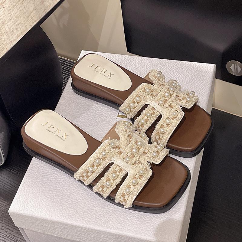 Pearl French holiday cool slippers women's summer wear 2025 new flat-bottomed non-slip with skirt gentle one-word slippers