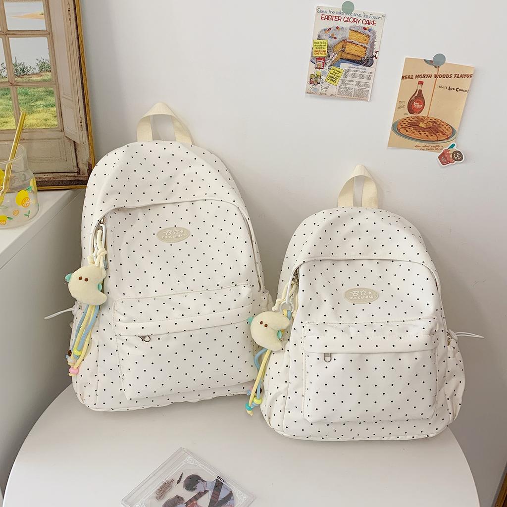 Schoolbag fashion Korean version niche polka dot simple primary school students lightweight versatile ins wind outdoor leisure large capacity backpack