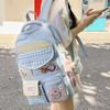 New high-value Japanese ins schoolbag for women, fresh and sweet plaid backpack, light spring outing and large-capacity backpack.