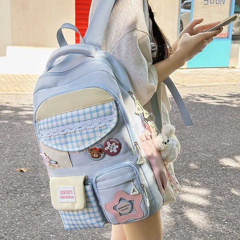 New high-value Japanese ins schoolbag for women, fresh and sweet plaid backpack, light spring outing and large-capacity backpack.