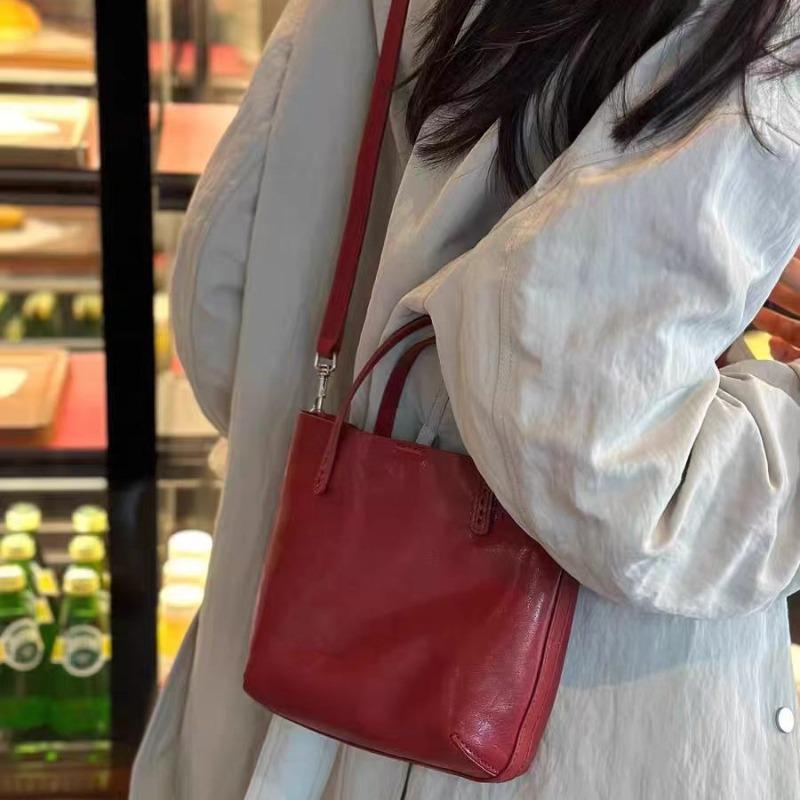New Commuter Soft Leather Bucket Bag Women's Premium Sense Portable Tote Bag Vegetable Tanned Soft Leather Shoulder Messenger Bag